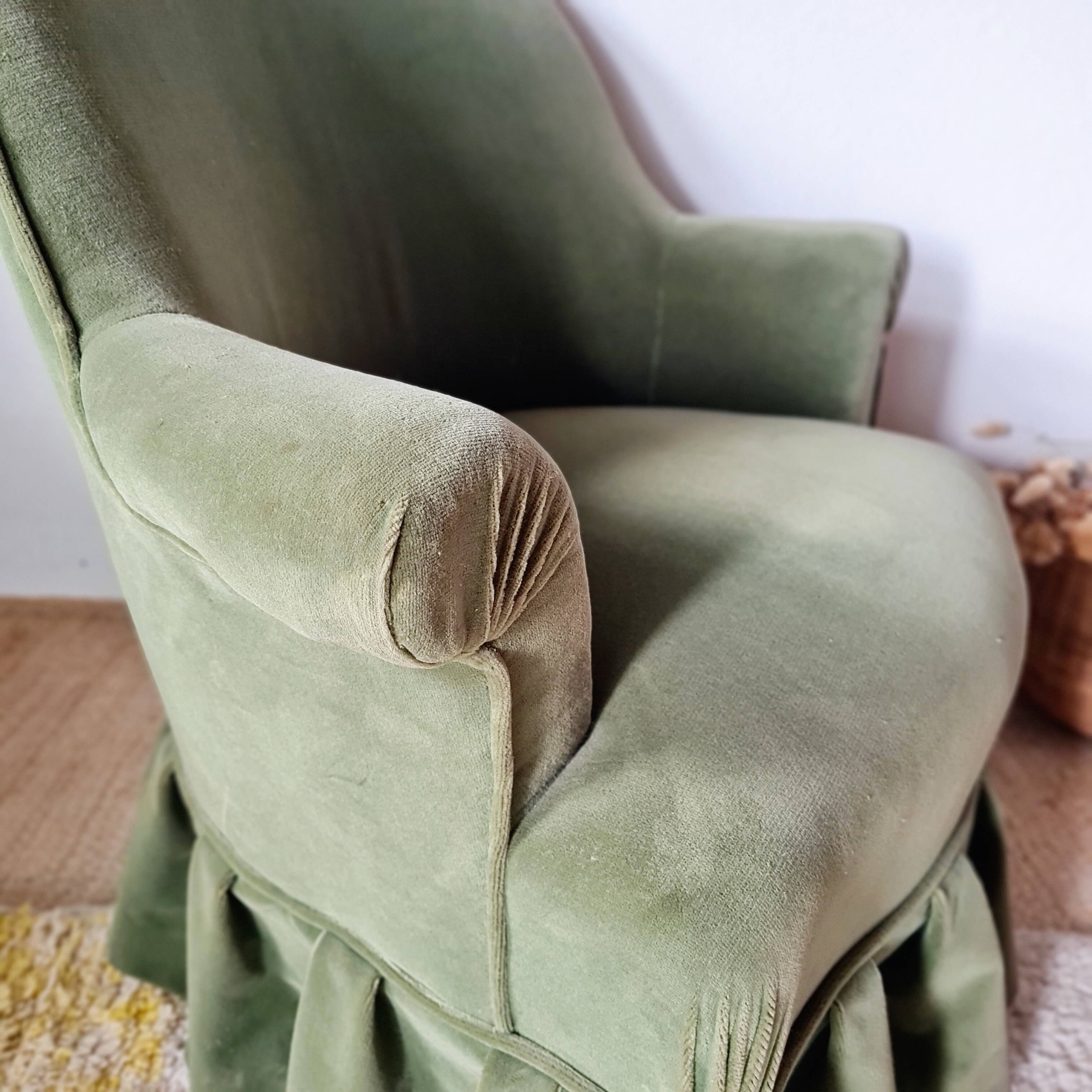 Green velvet armchair