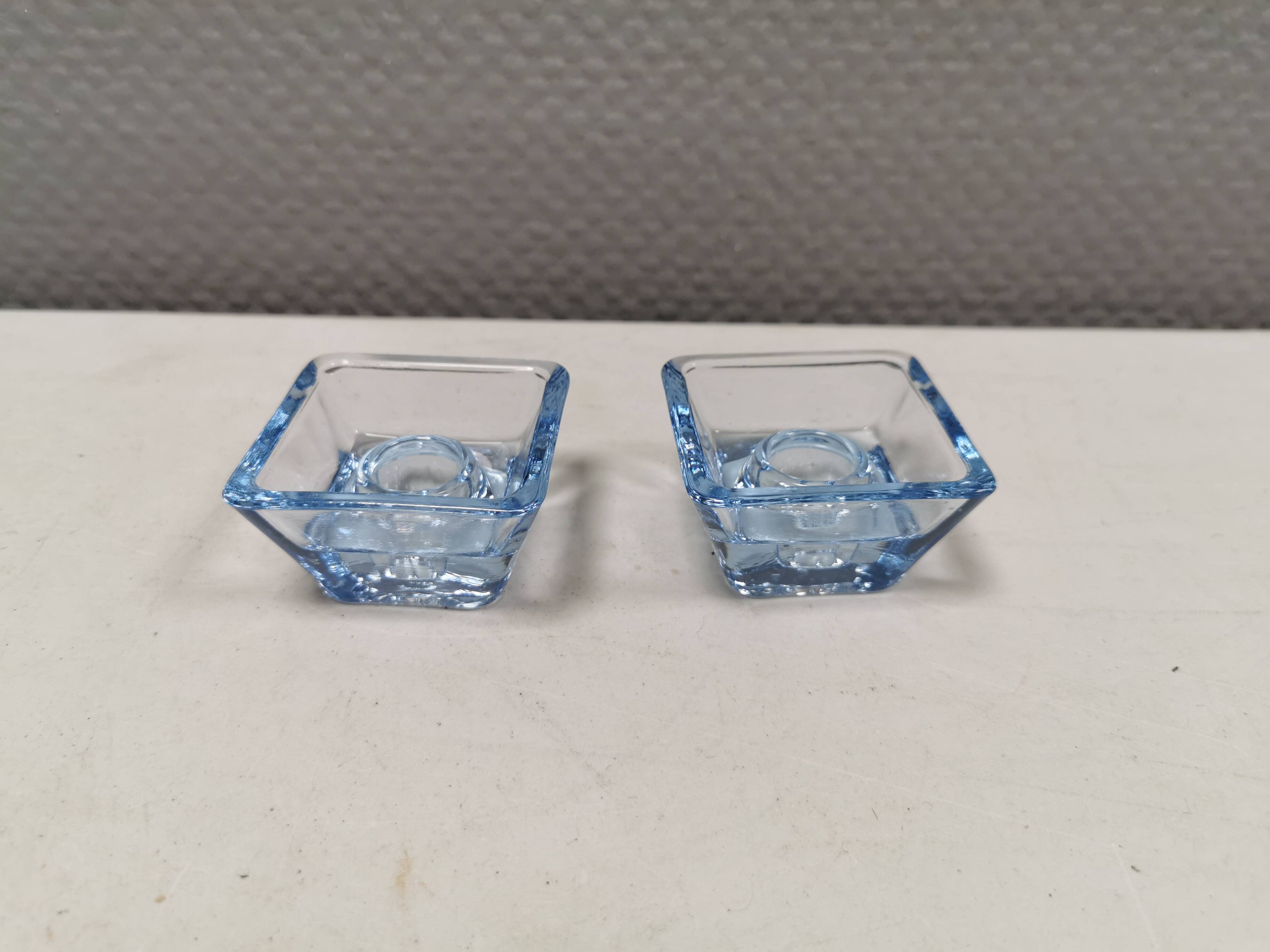 Two candleholders in turquoise/tranparent glass from Danish Kastrup-Holmegaard glassworks 1965-72