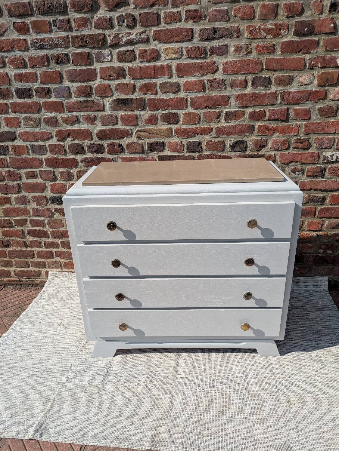 Marble-topped chest of drawers
