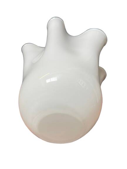 White glass vase in corolla shape