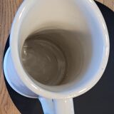 Cream glazed ceramic pitcher