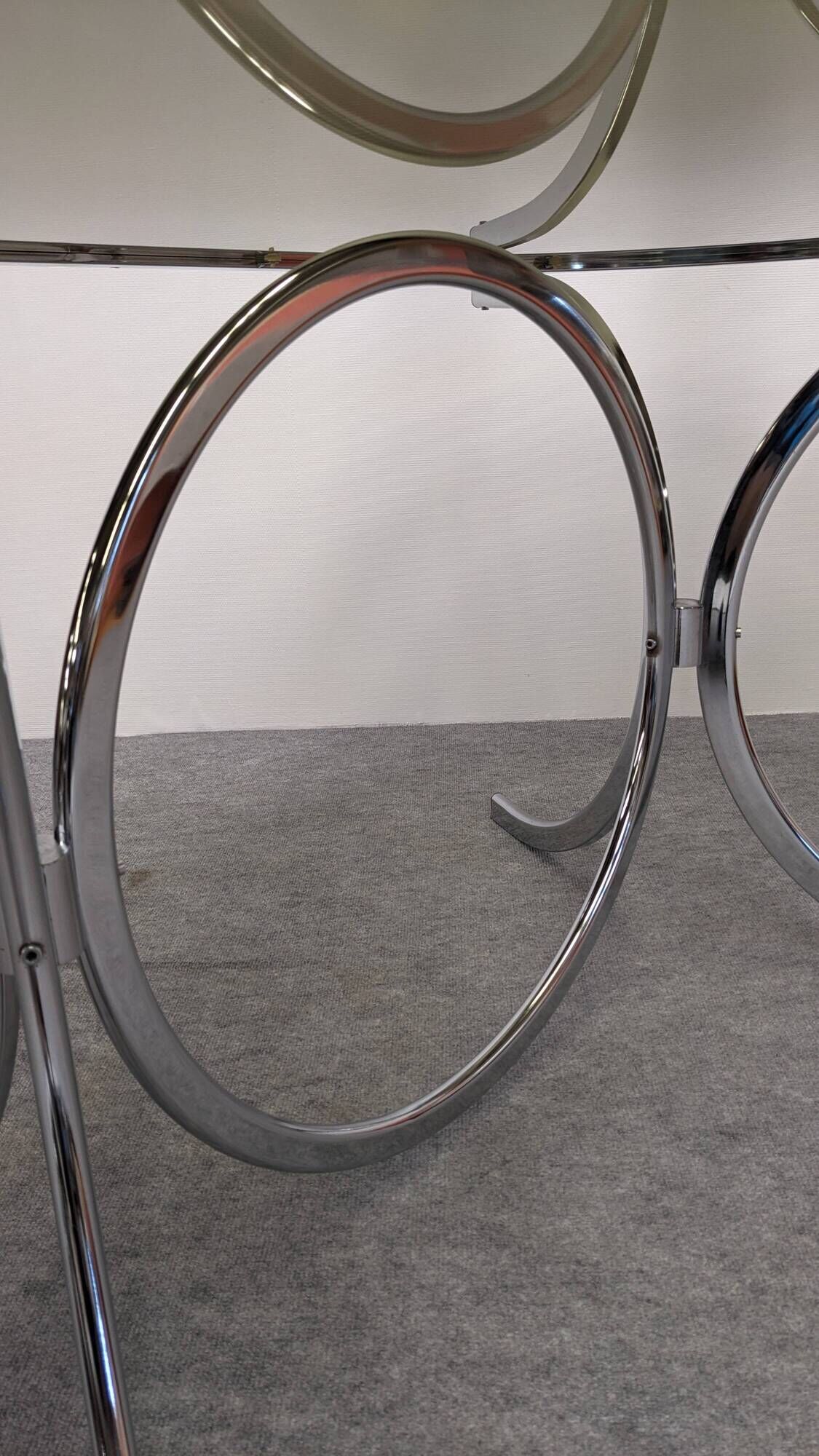 Oval dining table in chromed metal and smoked glass, Italy circa 1970