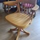 Wooden swivel armchair