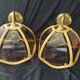 Wall sconces in rattan and smoked glass