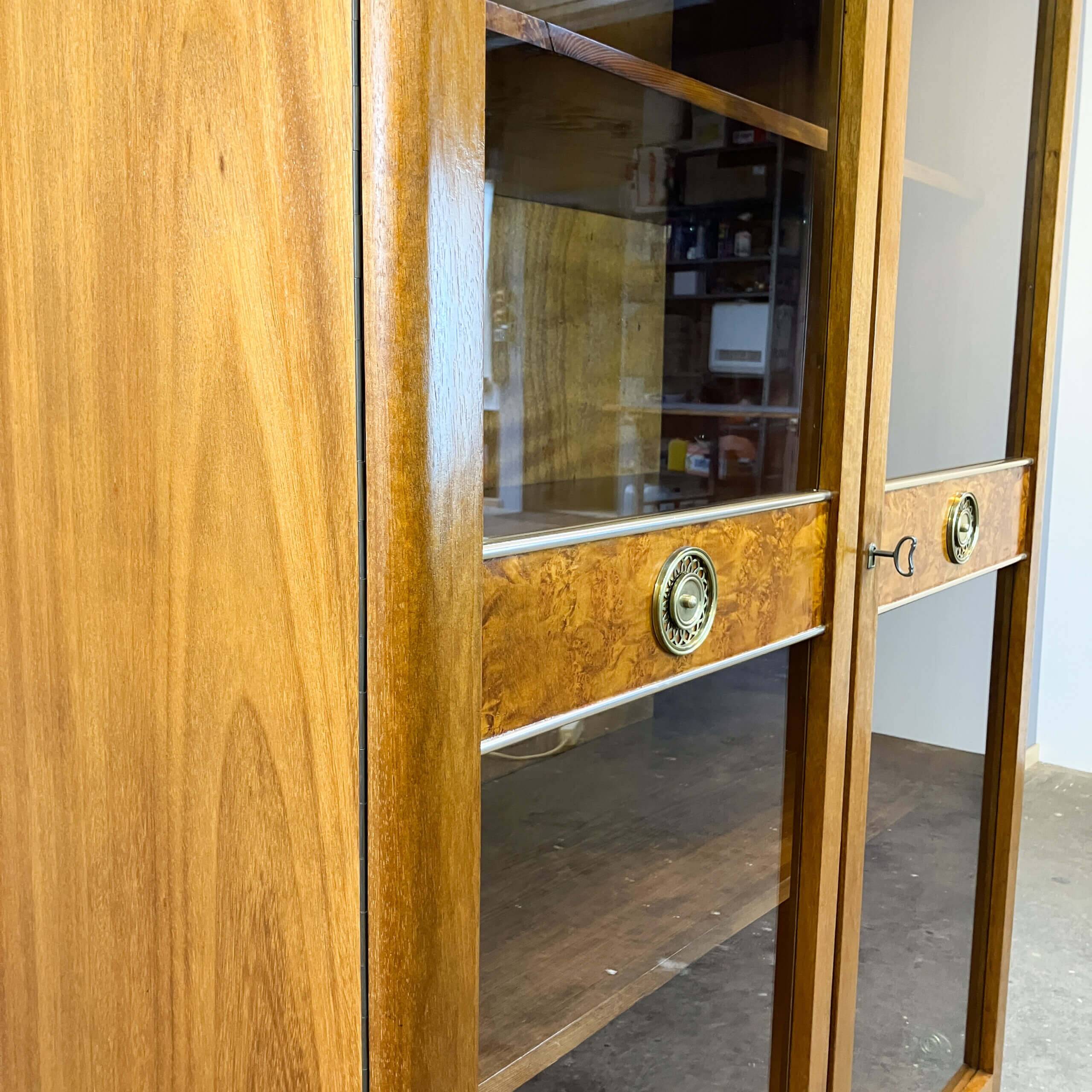 Art Deco cabinet with glass doors, various woods, 1930s