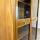 Art Deco cabinet with glass doors, various woods, 1930s
