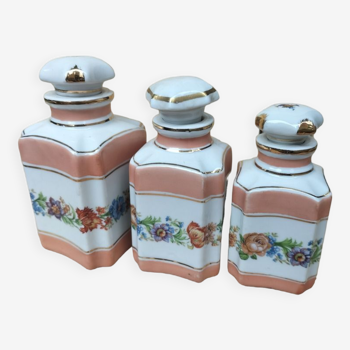 Trio of vintage porcelain bottles