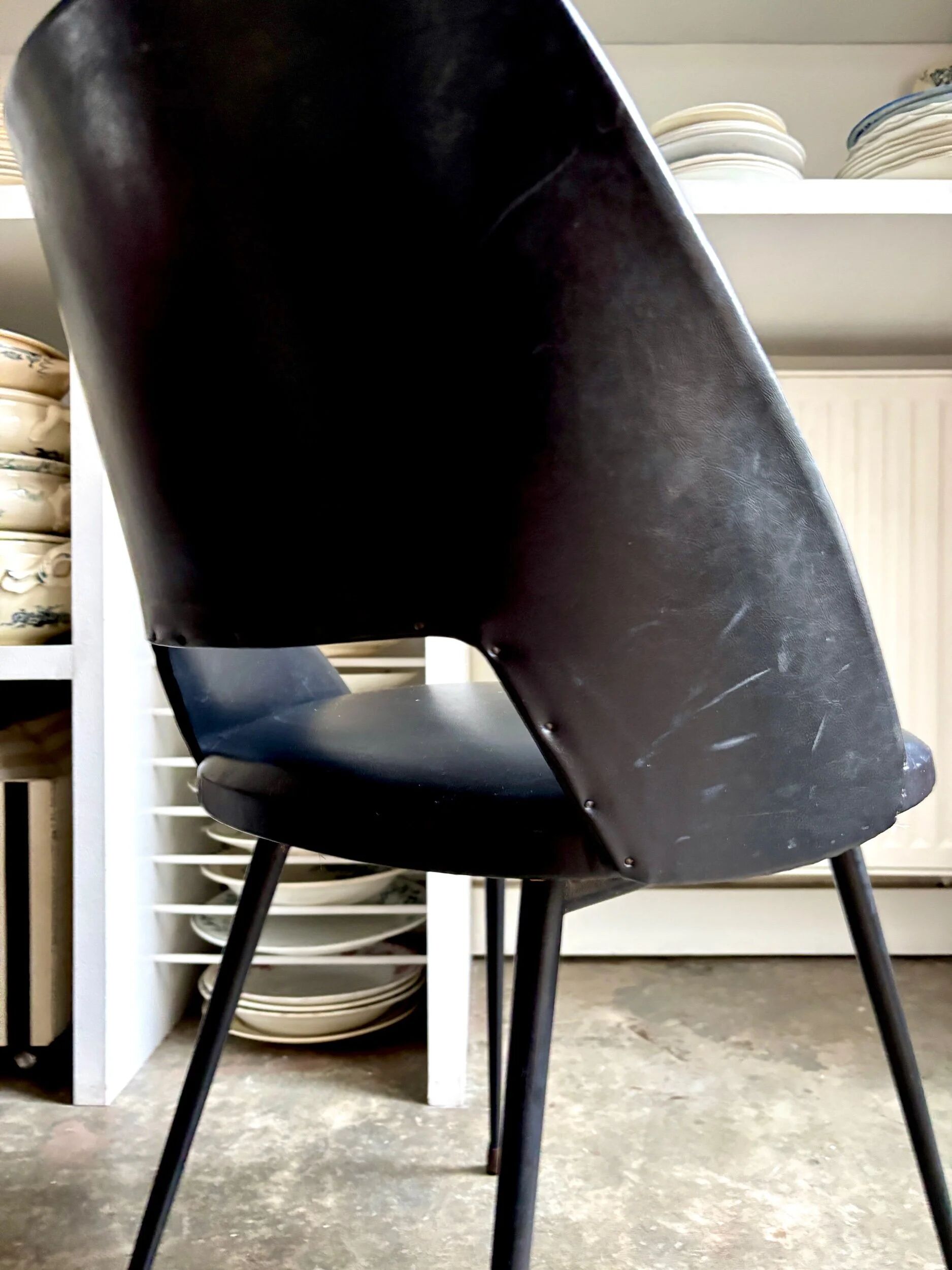 Chair in black faux leather