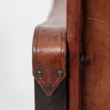 “Safari” armchair in wood and cognac leather. 1960s/70s.