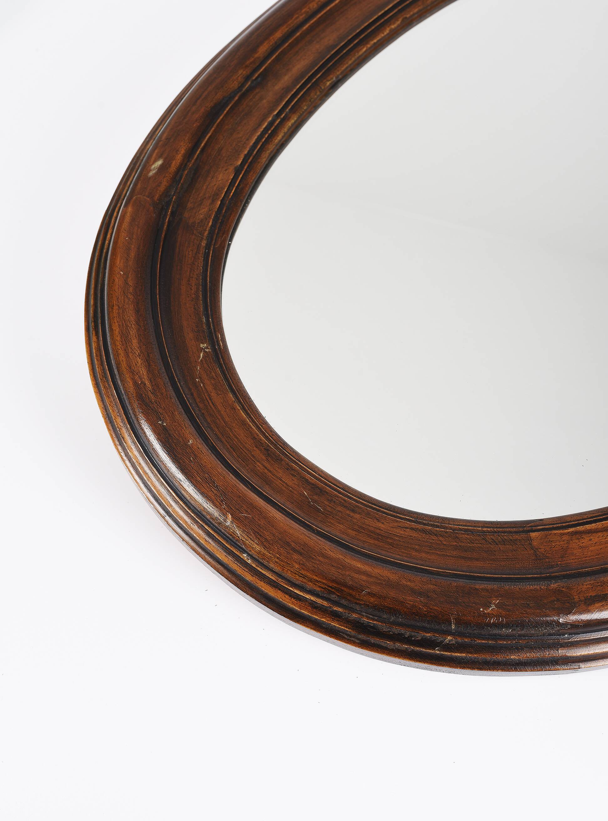 Large old oval wooden mirror