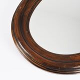 Large old oval wooden mirror
