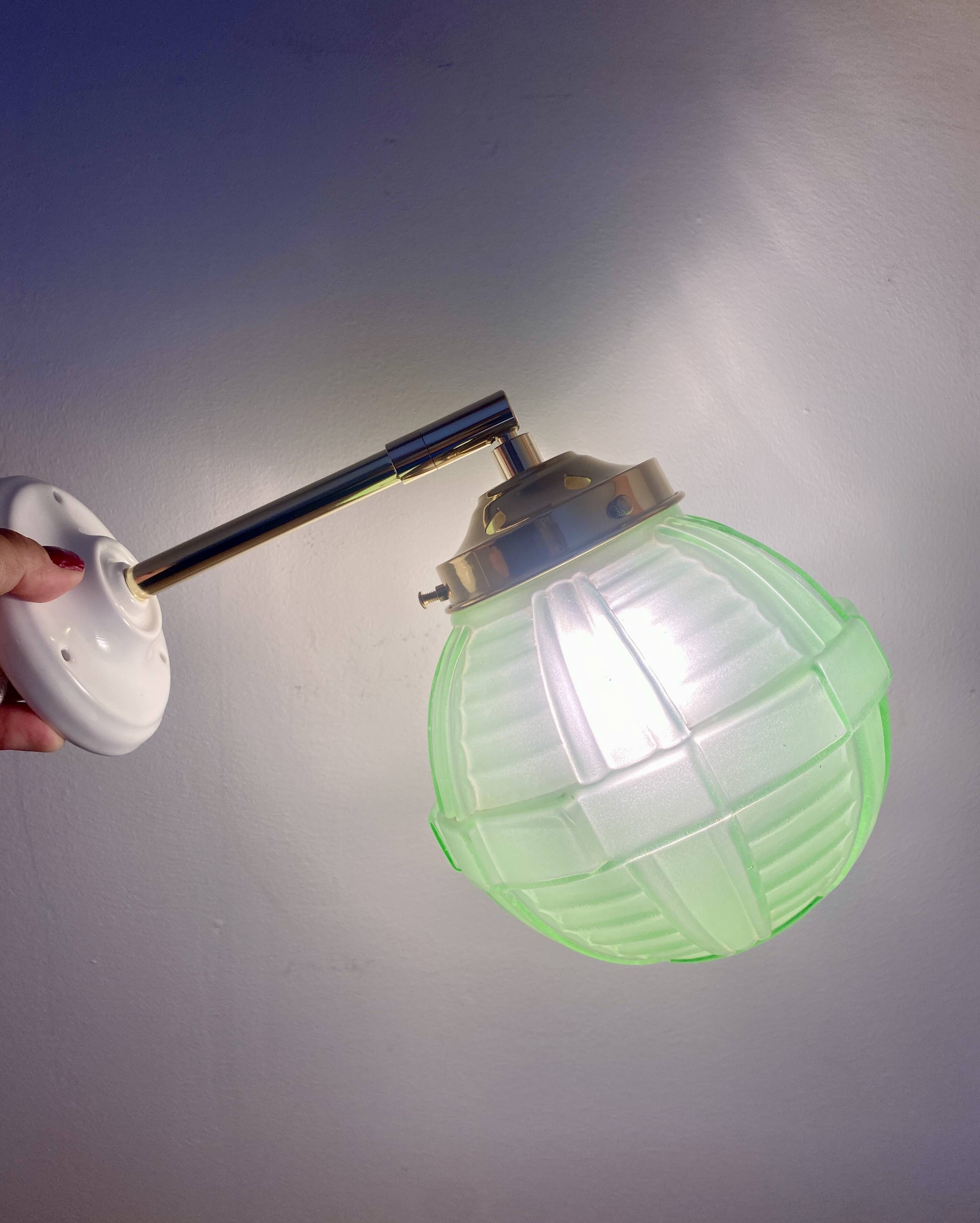 Vintage art deco globe wall light in green glass
