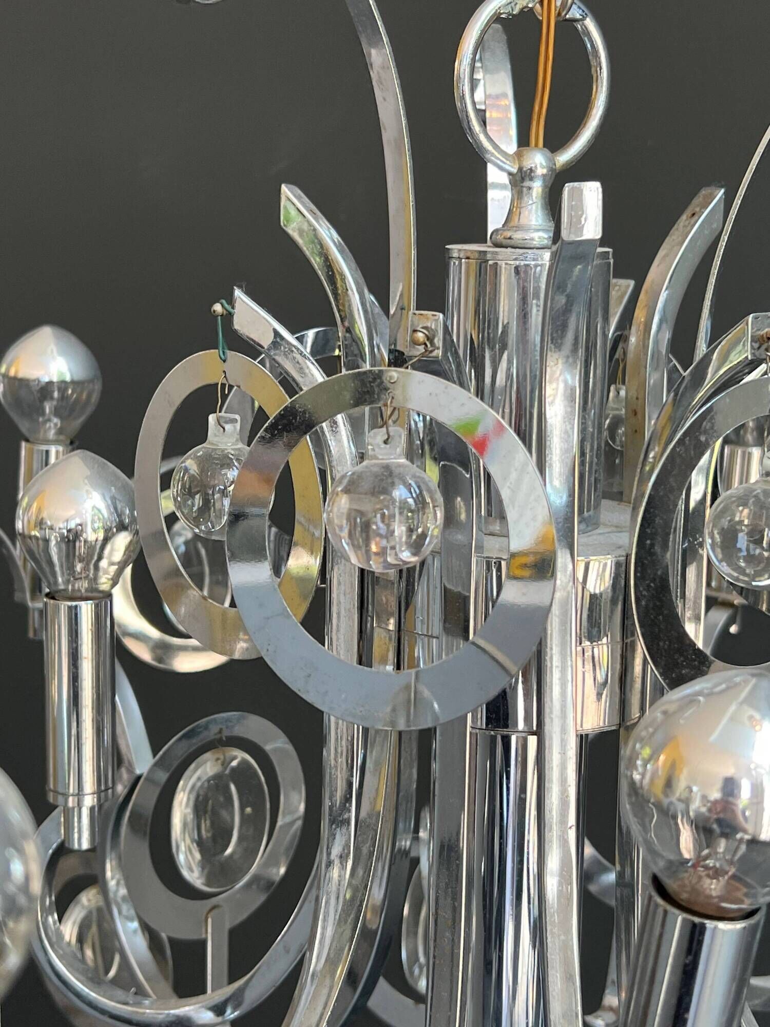 Chrome Metal Design with Swirls and Optical Glass Lenses. Tra