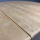 Oval extendable dining table in beech with Danish design.