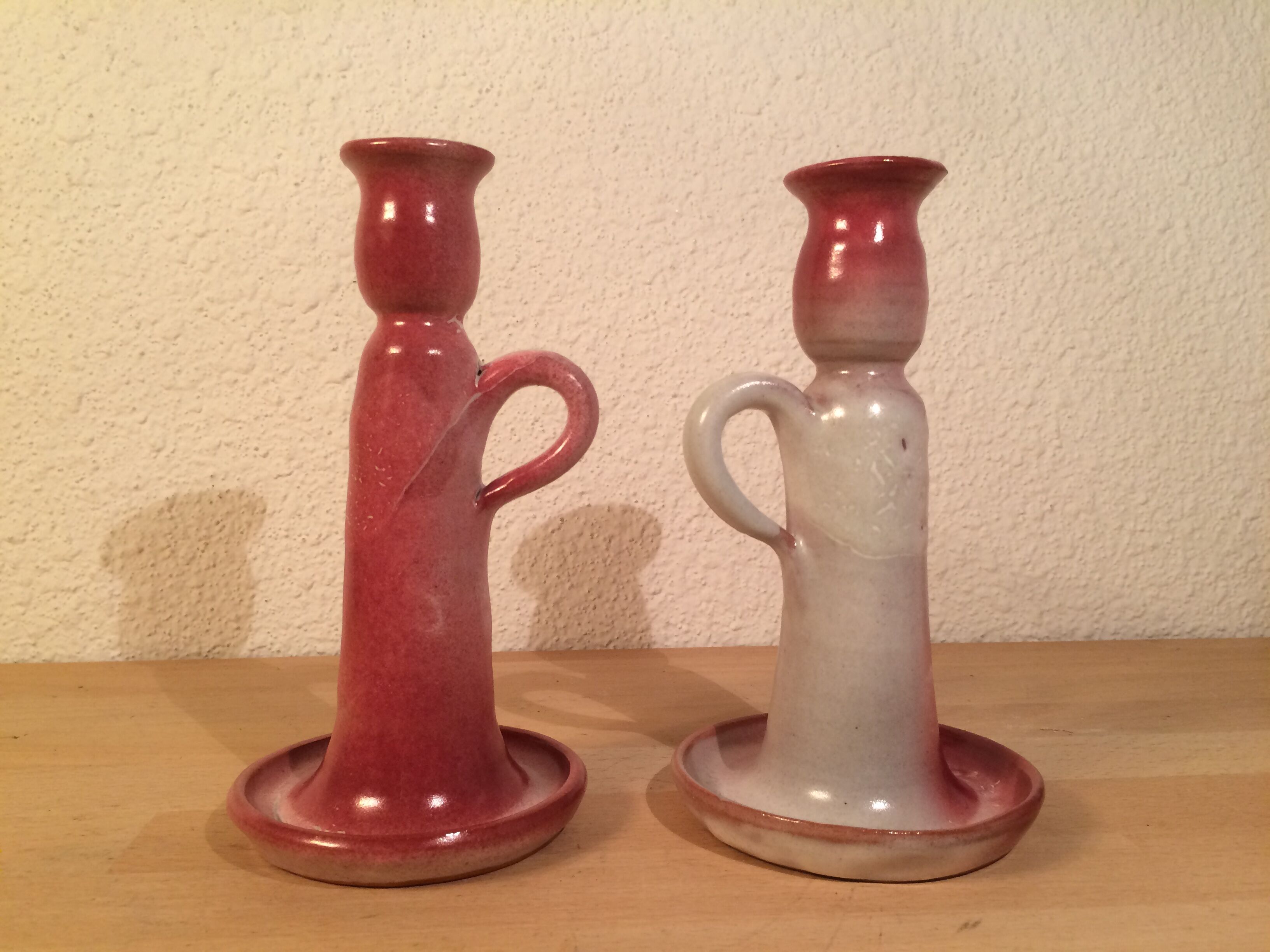 Pair of pink ceramic candle holders