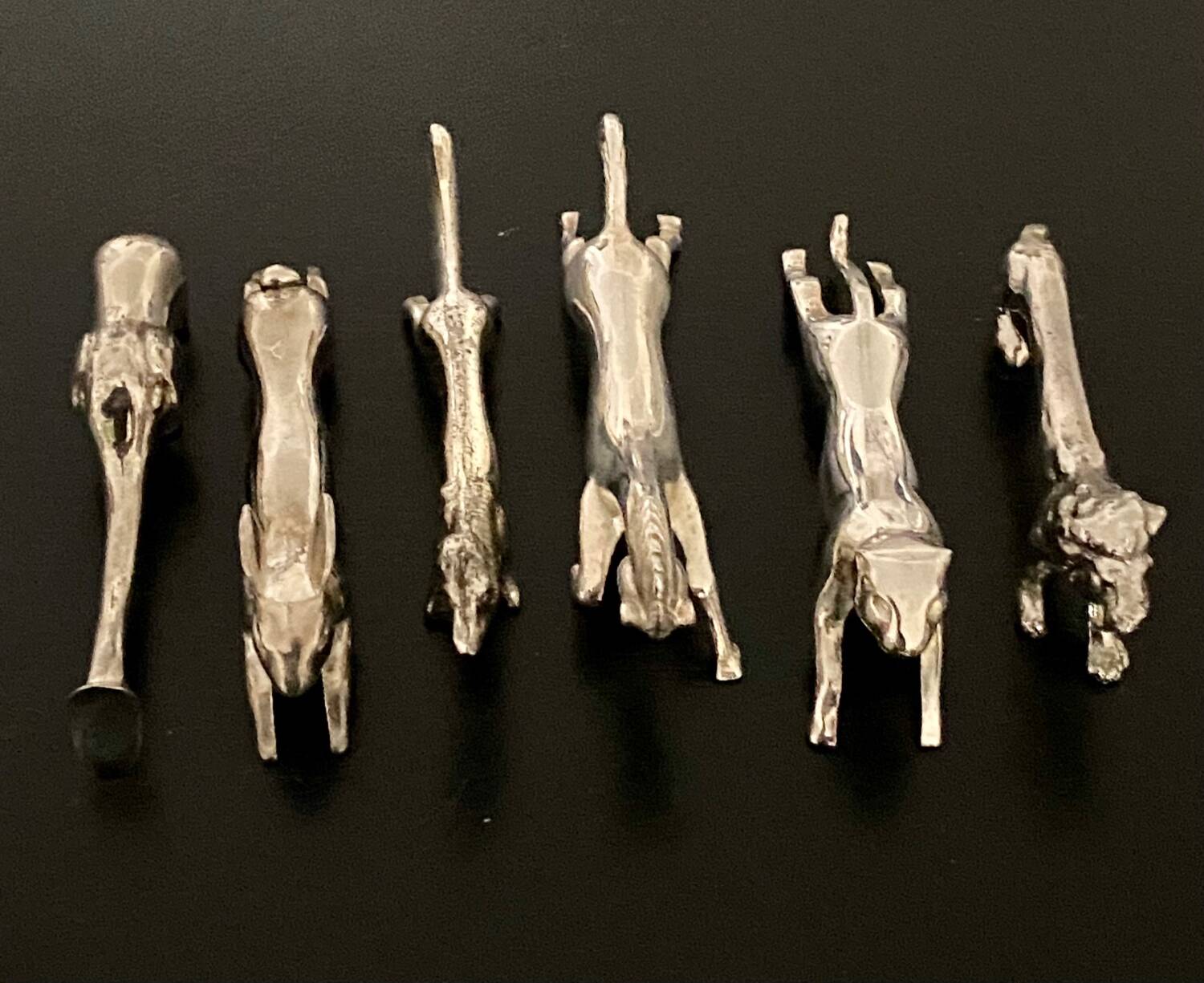 6 various animal shaped knife holders in silver metal