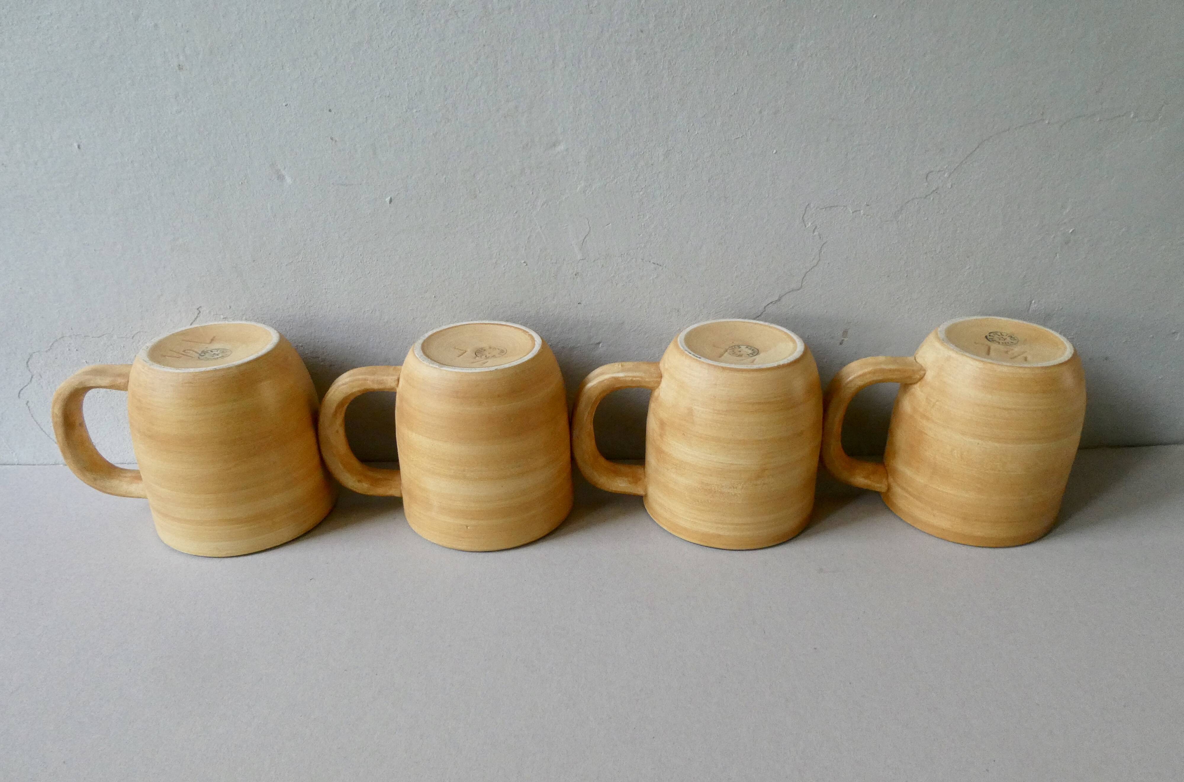 4 mugs Salins France, grès et émail vert