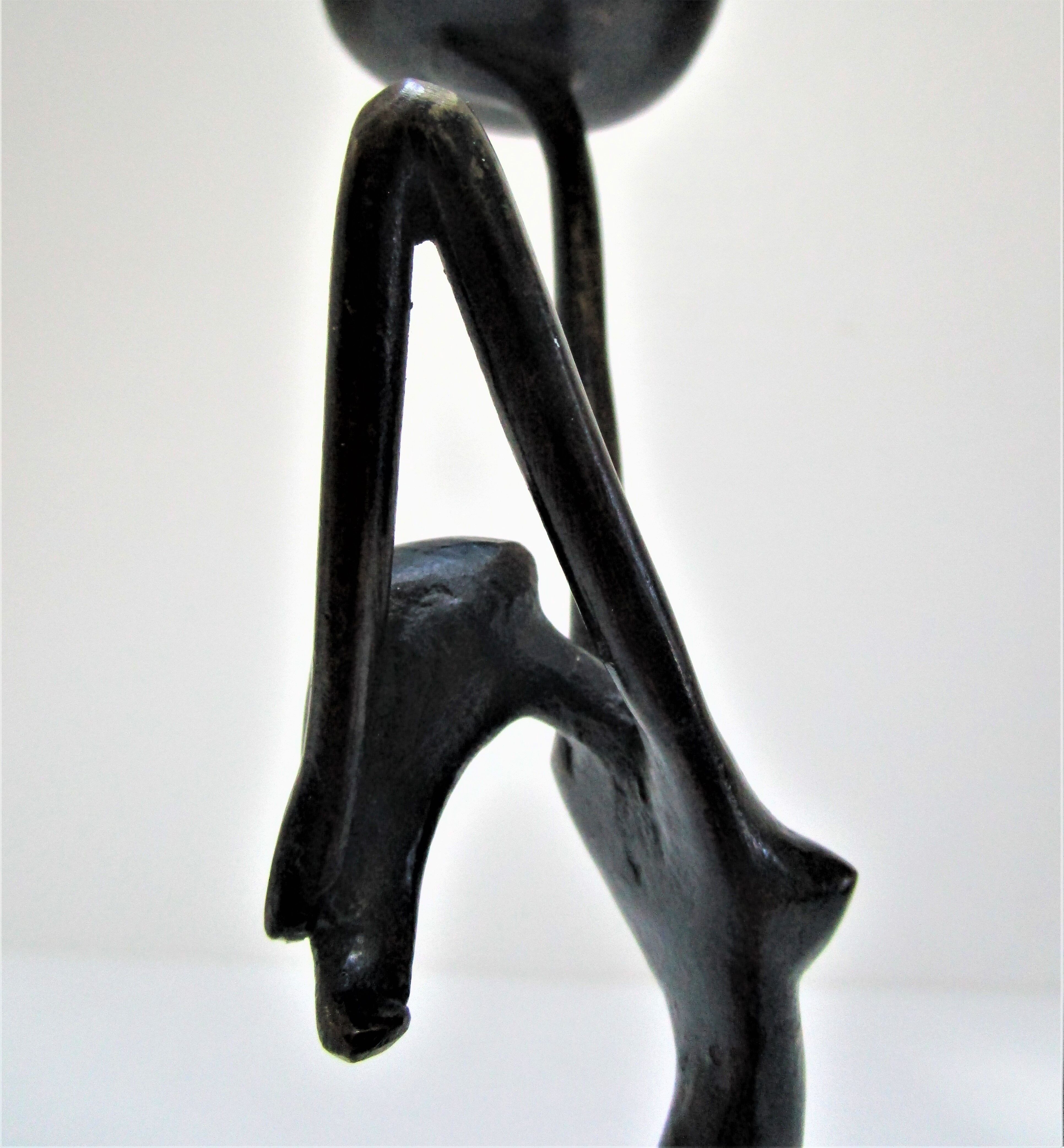 Sculptural candlestick anthropomorphic bronze blackened with woman's figure 70s