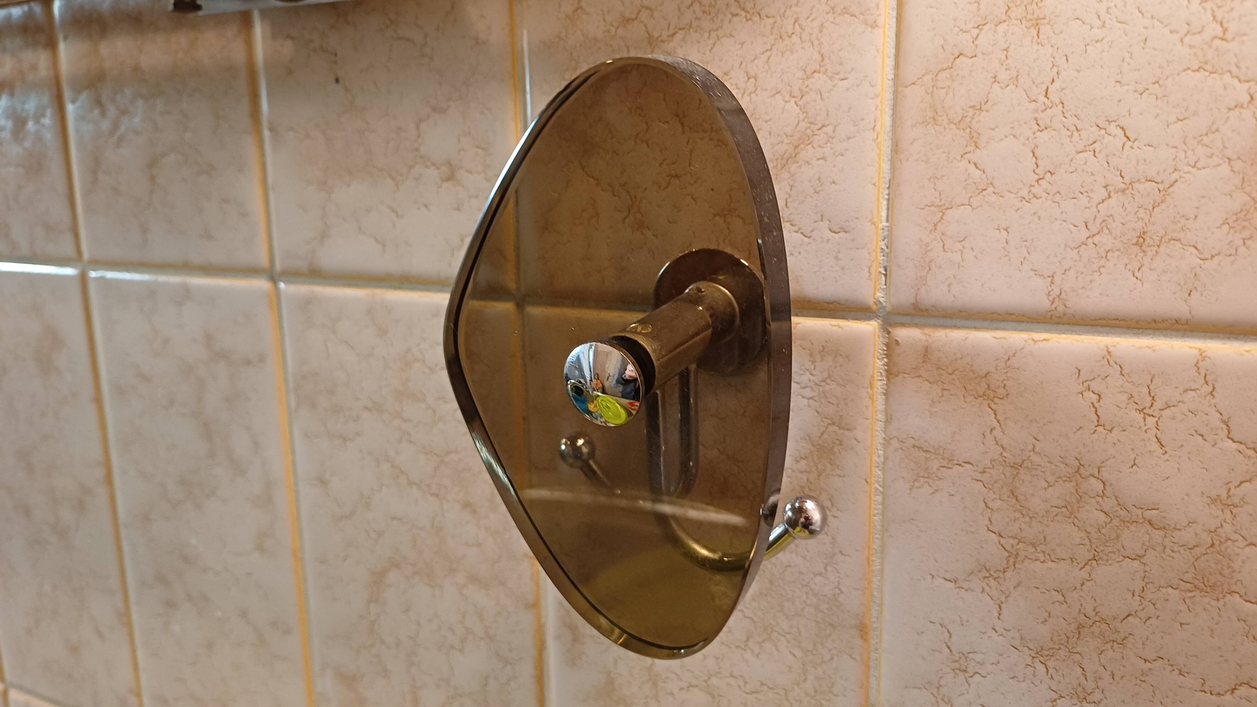 Vintage bathroom mirror with hooks