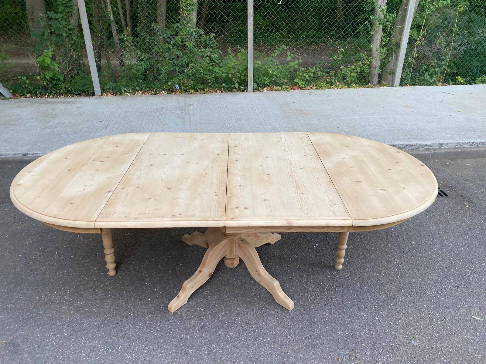 Large round extendable dining table renovated in raw pine with 2 extensions, 1980.