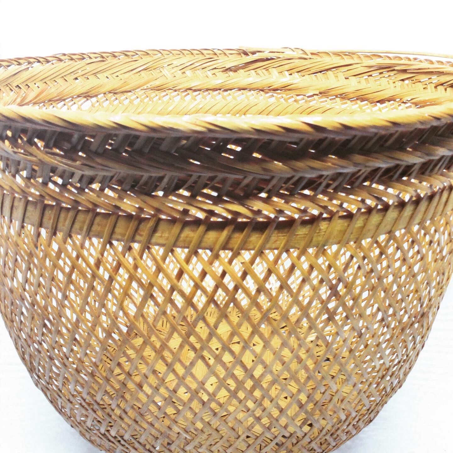 Openwork braided rattan basket