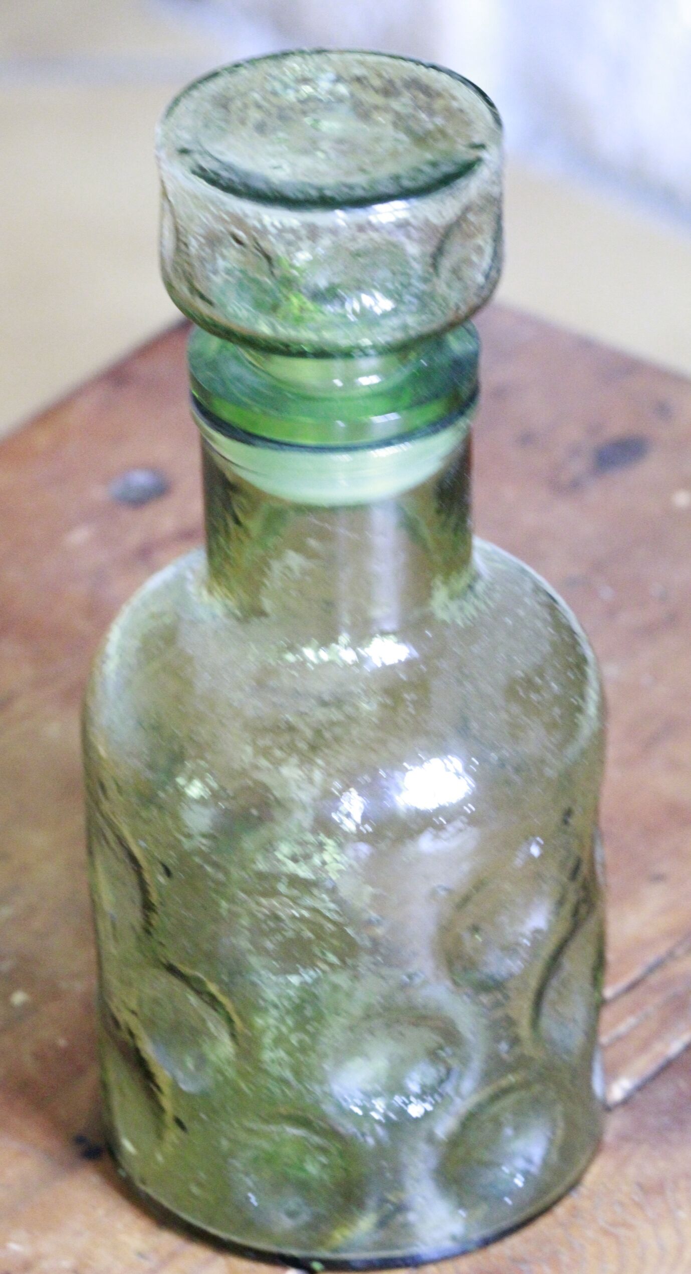Green bottle made of old glass