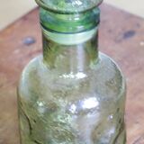 Green bottle made of old glass