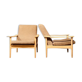 Mid-century pair of elm armchairs by Guy Rogers