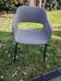Pedrali Babila fabric armchair with black ash legs.