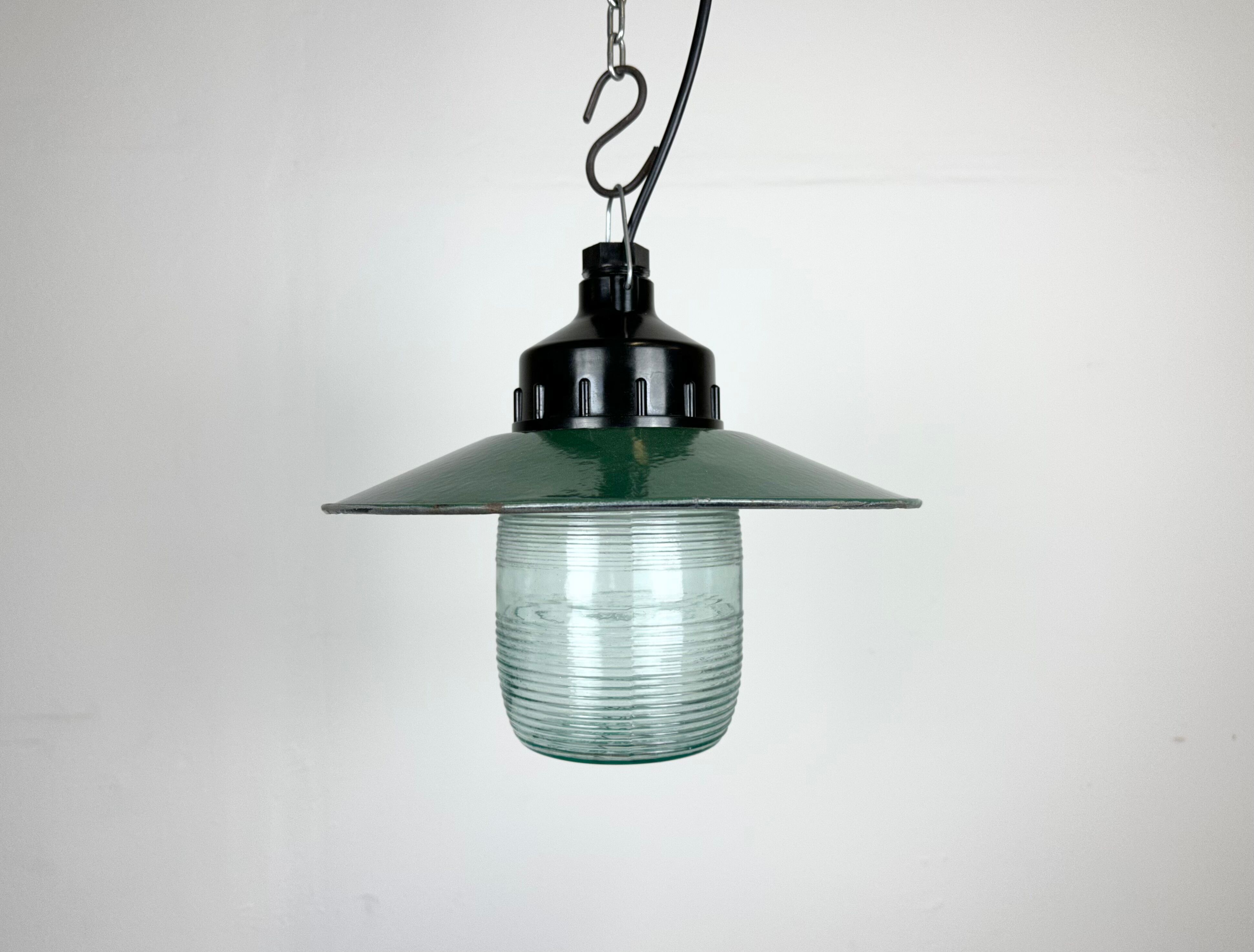 Industrial bakelite green enamel pendant light with ribbed glass, 1970s