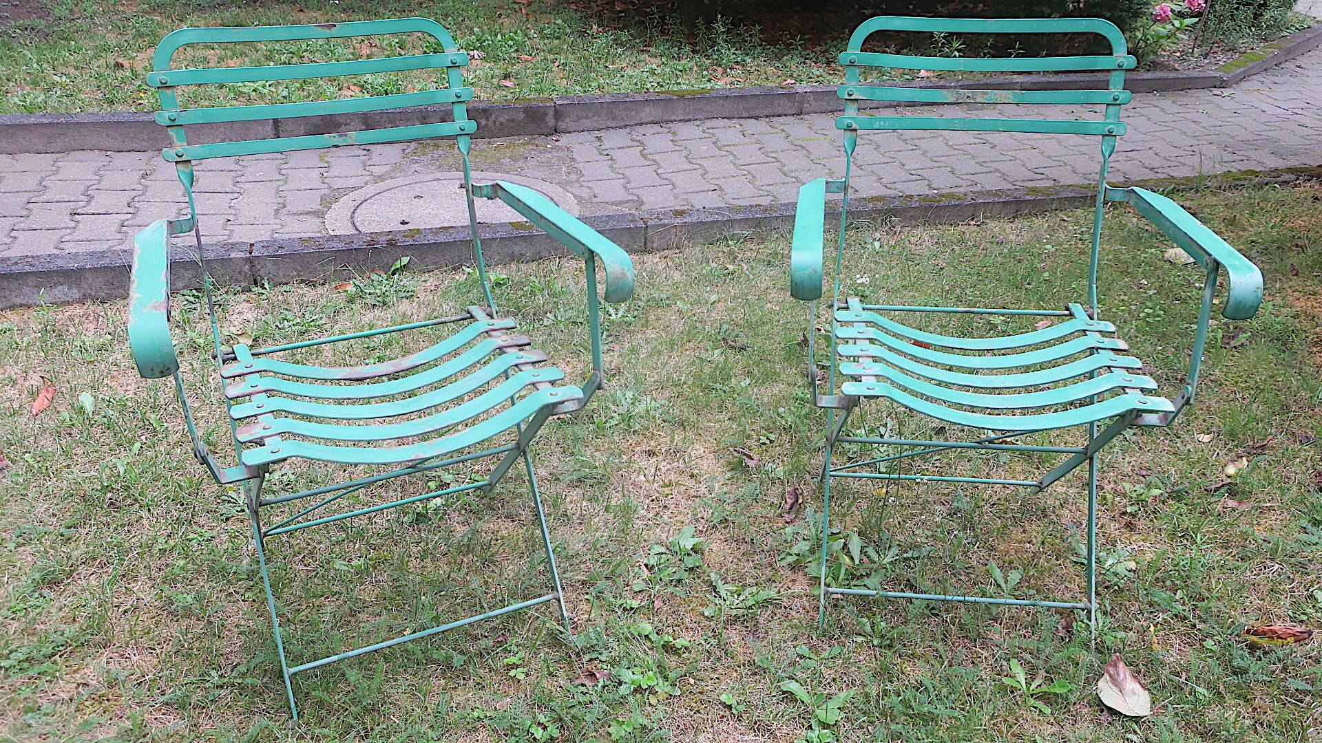 Pair of mid century distressed painted iron garden chairs
