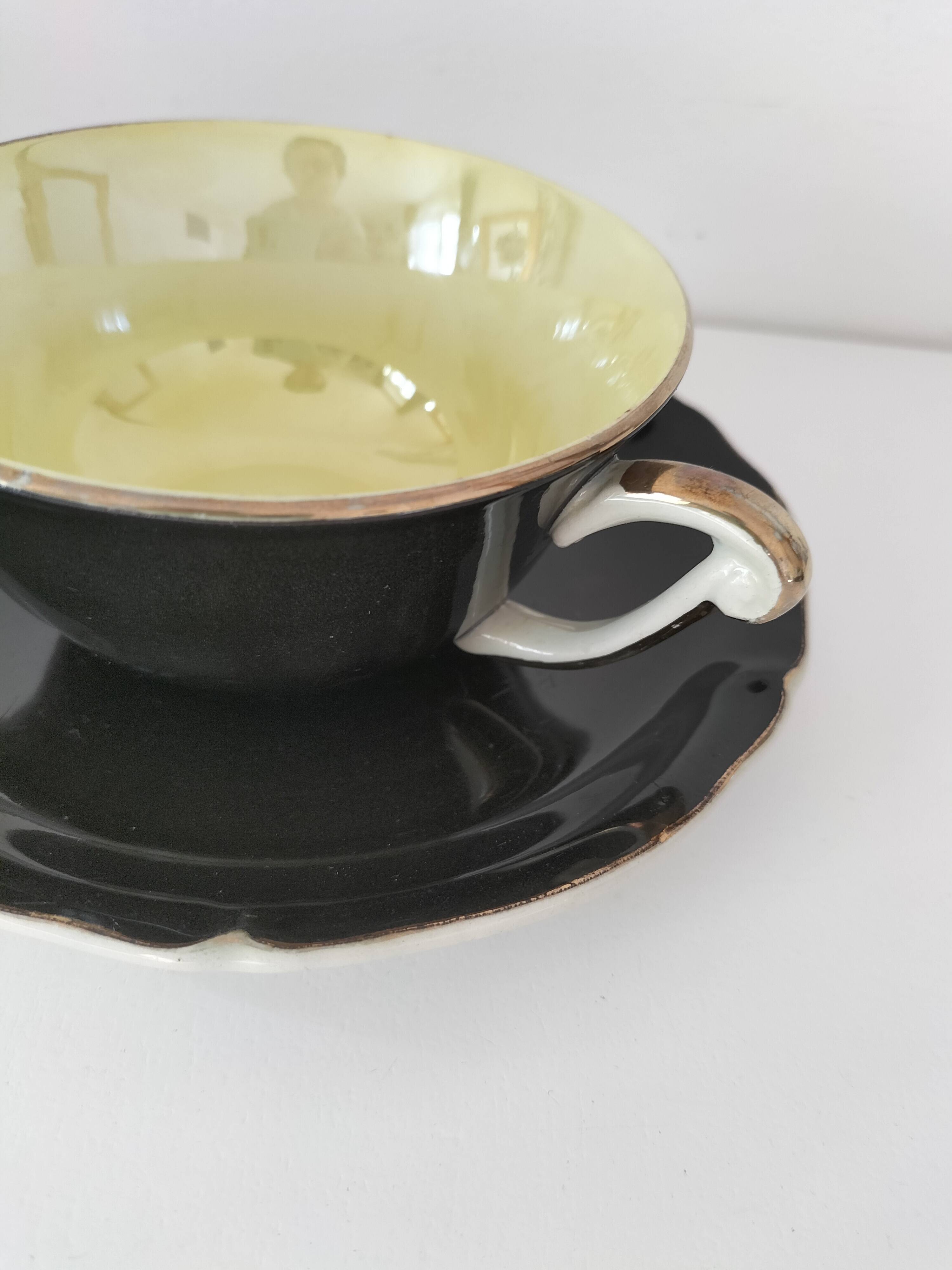 Large black, yellow iridescent and white Art Deco Saint-Amand cup.