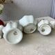 3 porcelain biscuit bottles from La Couleuvre art deco