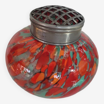 Antique vase of flowers in multicolored glass