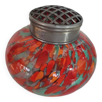 Antique vase of flowers in multicolored glass