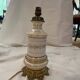Lot including 2 oil lamps from the 19th century, equipped with their electric wire.