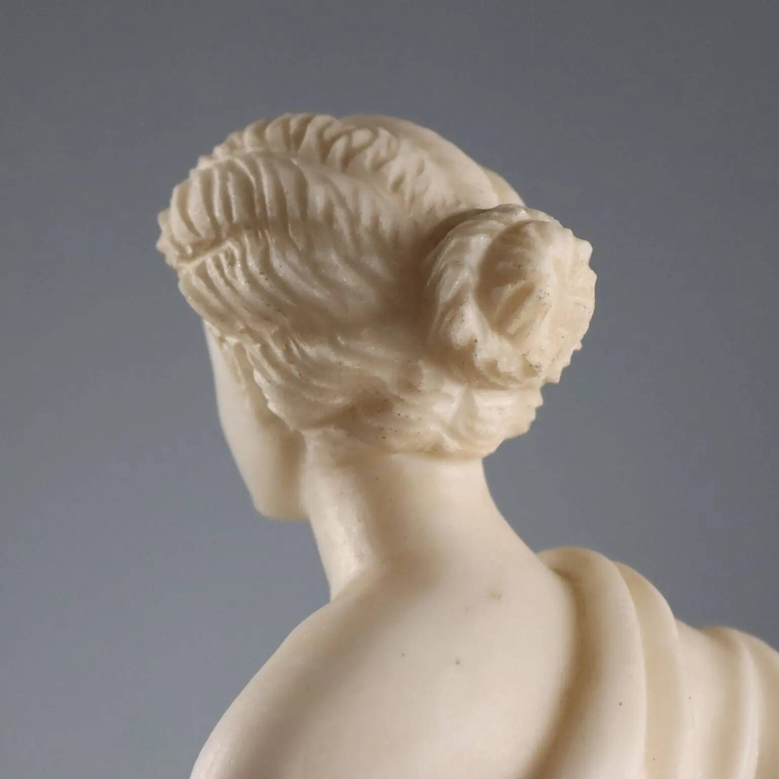 Sculpture of a Roman matron in white marble, Italy, 19th century.