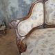 Small sofa or bench in Louis XV style, rococo.