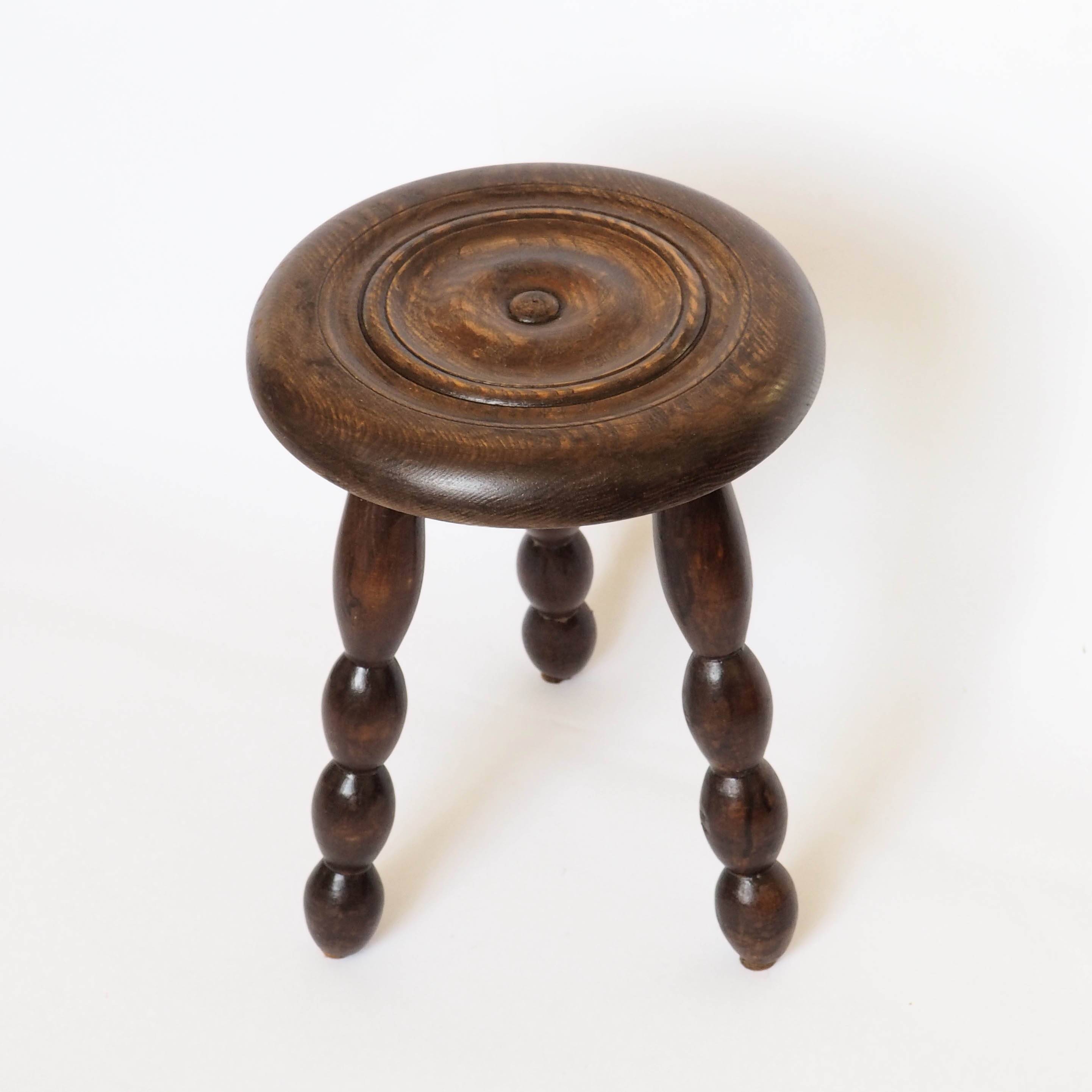 Beaded wooden tripod stool