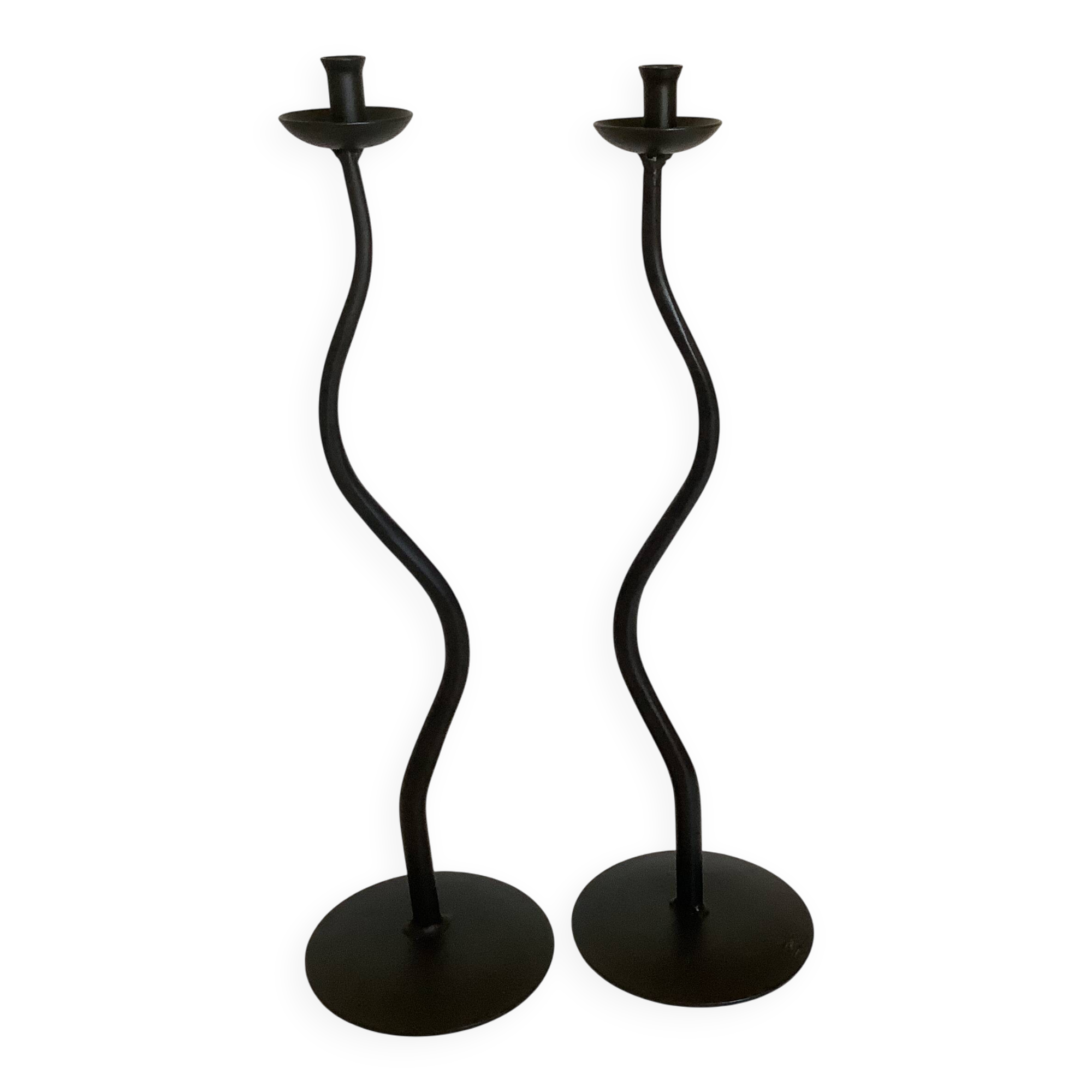 Pair of black hysteria-style candlesticks