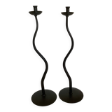Pair of black hysteria-style candlesticks