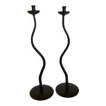 Pair of black hysteria-style candlesticks