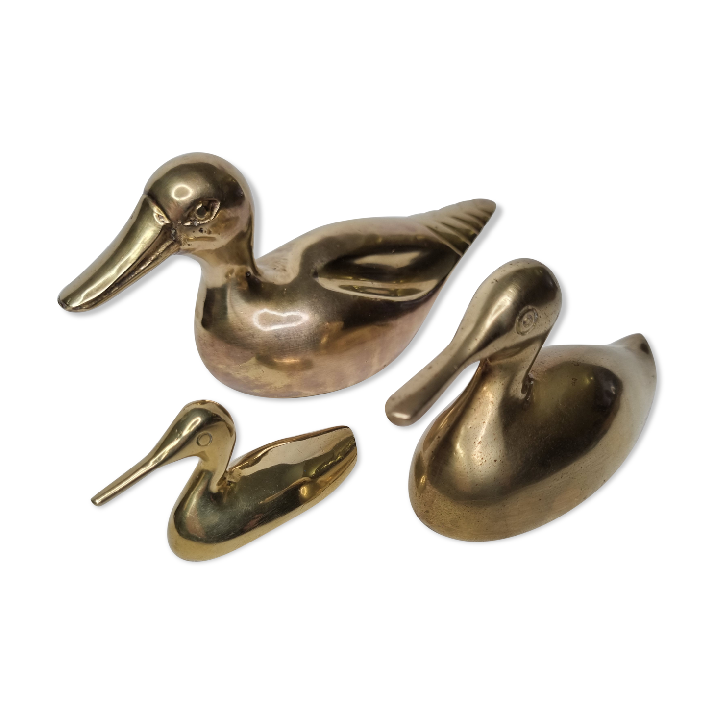 Set of three brass ducks