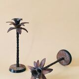 Pair of patinated metal candlesticks
