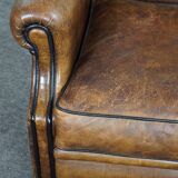 Fauteuil à oreilles en cuir de mouton