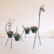Pair of metal and ceramic plant stands