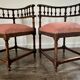 Pair of Renaissance-style corner chairs