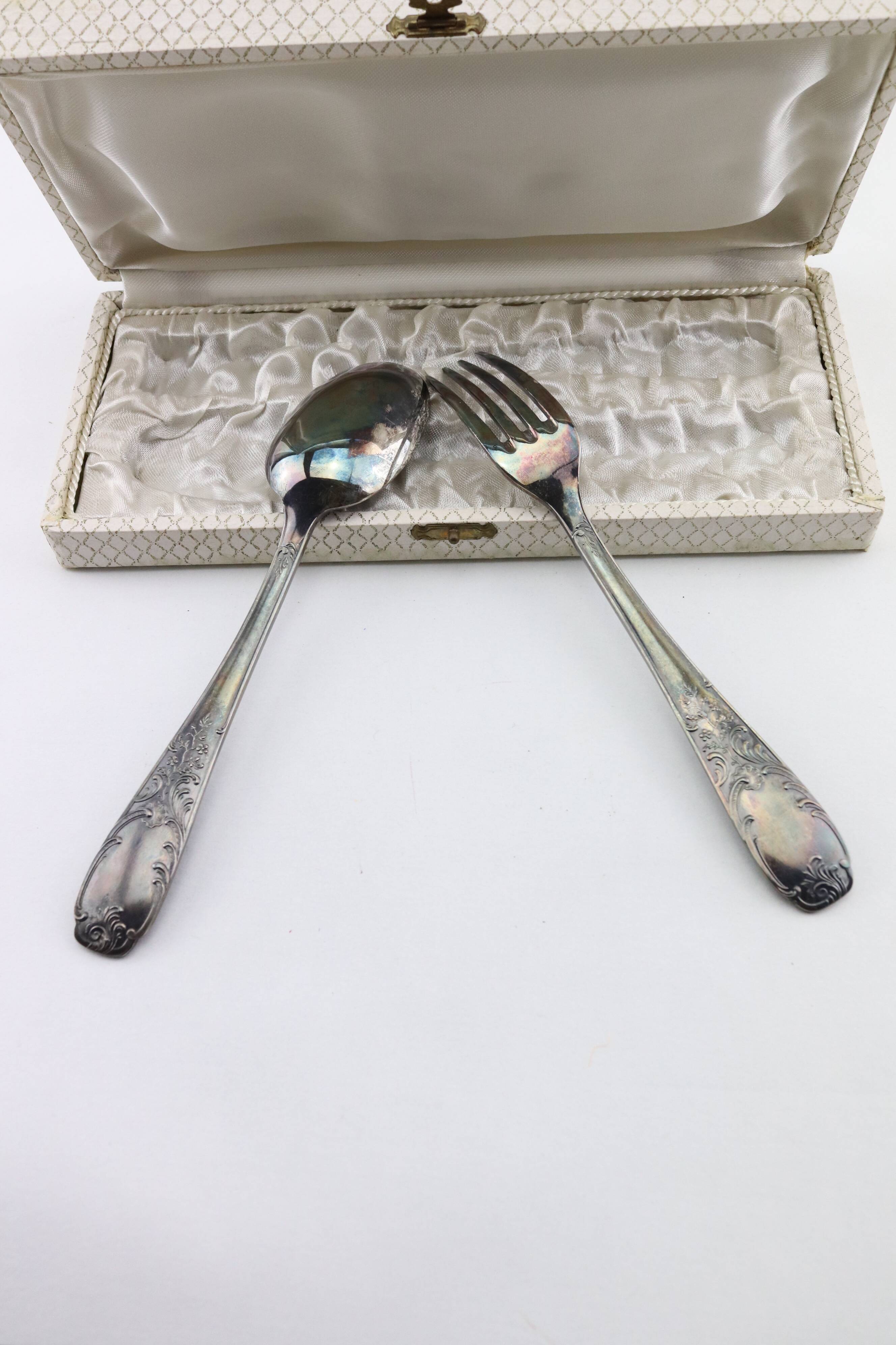 Old covered box in silver or silver metal spoon and fork with hallmarks