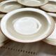 6 Deep plates in speckled beige stoneware, Tulowice style, Poland 1970