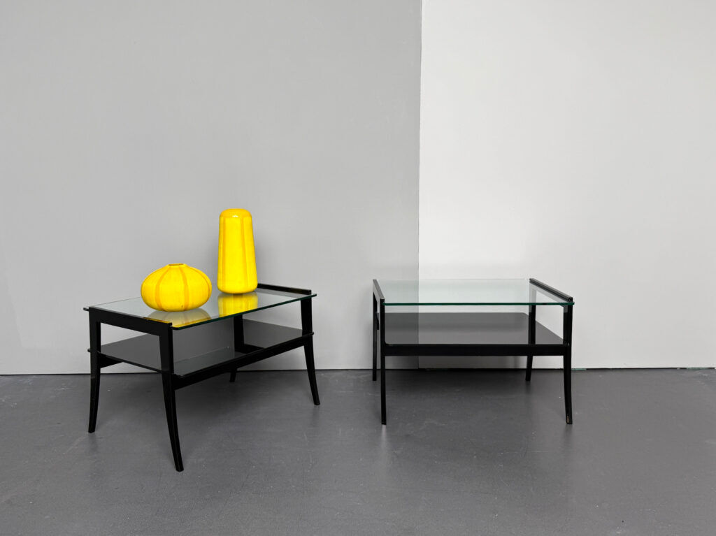 Pair of bedside tables, bedside consoles, black lacquer with glass tops, Italy, 1970s